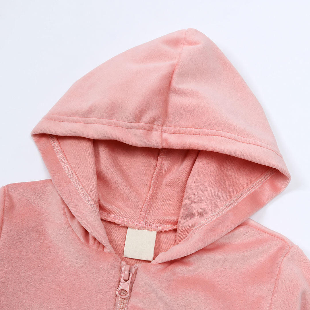 Close-up of the pink hood and zipper neckline