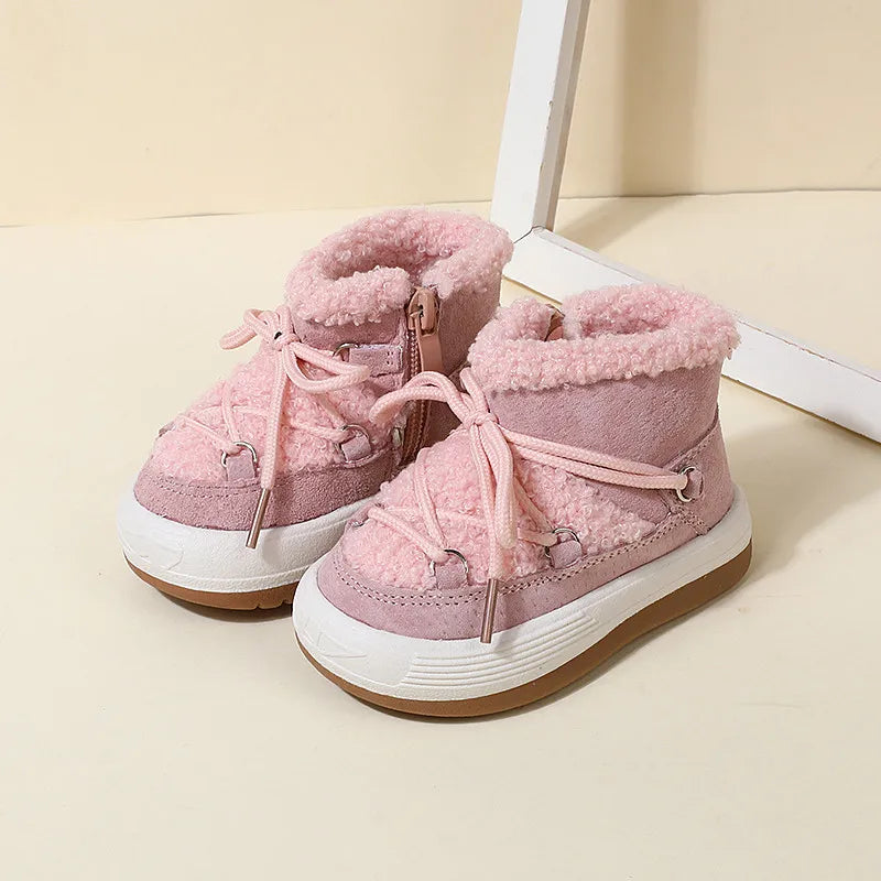 Pink winter boots with fluffy collars, front laces, and contrasting white and brown soles