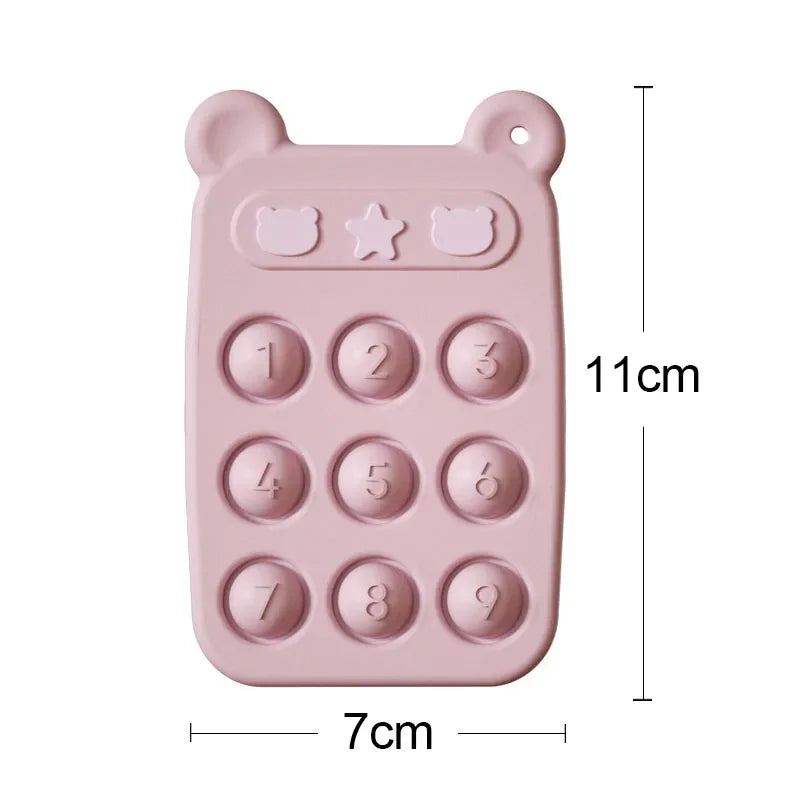 Pink silicone phone shown with measurements of 7 cm wide and 11 cm tall