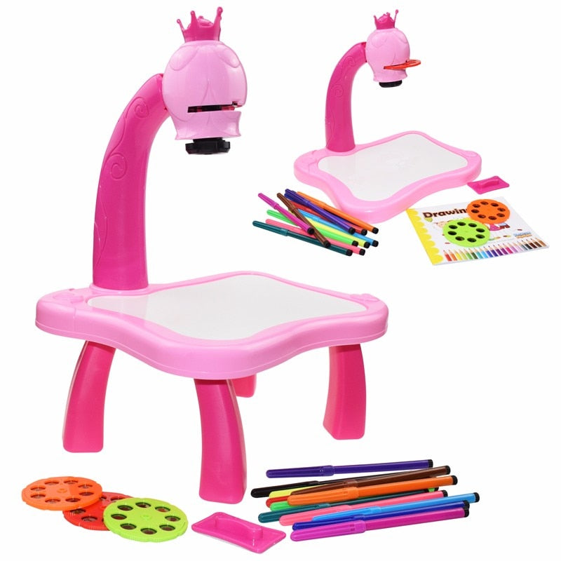 Pink princess drawing projector shown from two angles with pencils, picture discs and a drawing book