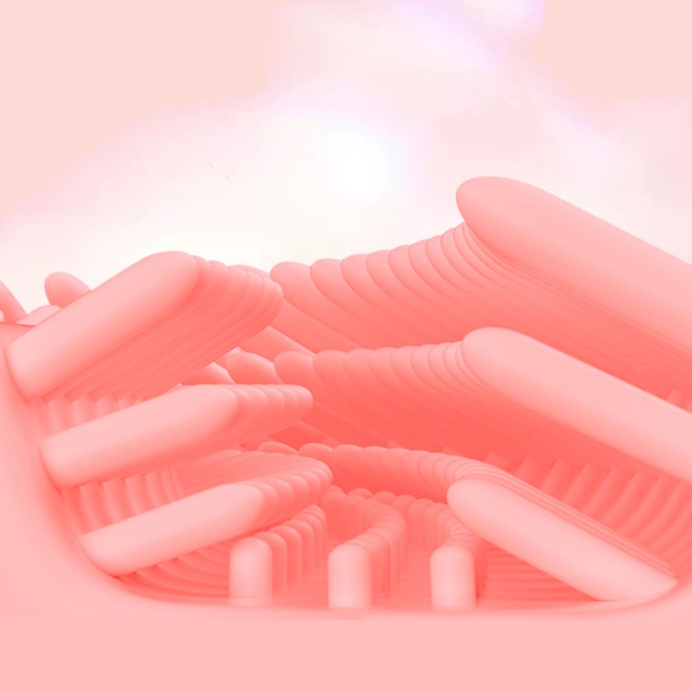 Close-up of soft pink silicone bristles inside the U-shaped toothbrush head