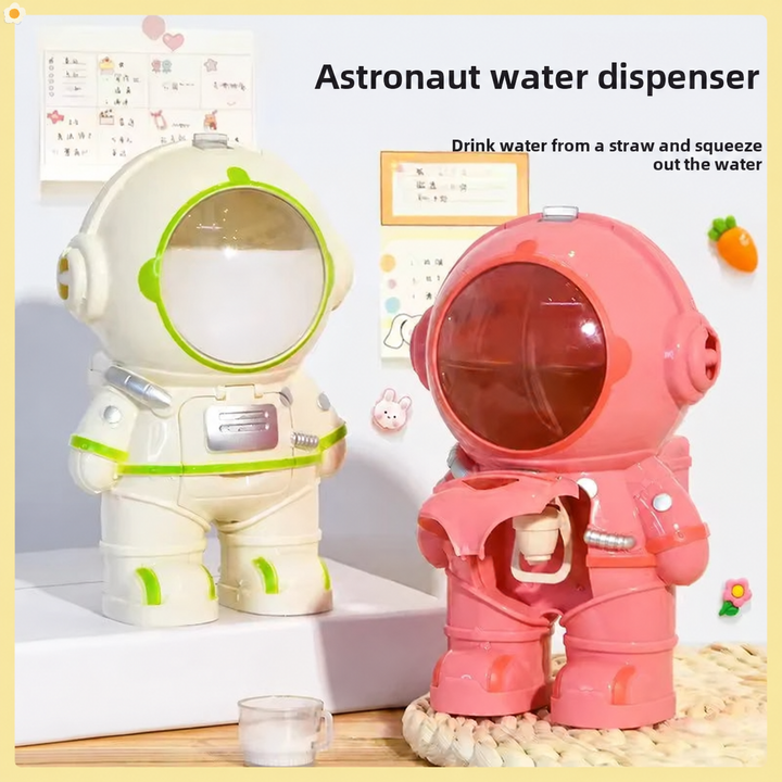 White and pink astronaut water bottles with a small drinking cup and an open front dispenser.