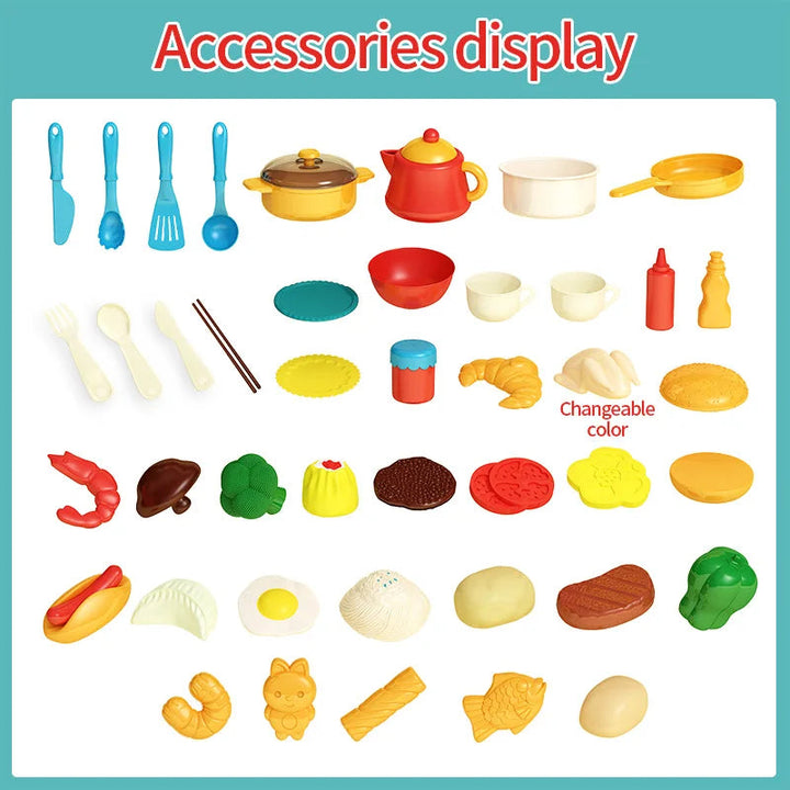 Assortment of play cookware, utensils, dishes, and pretend food for the kitchen set