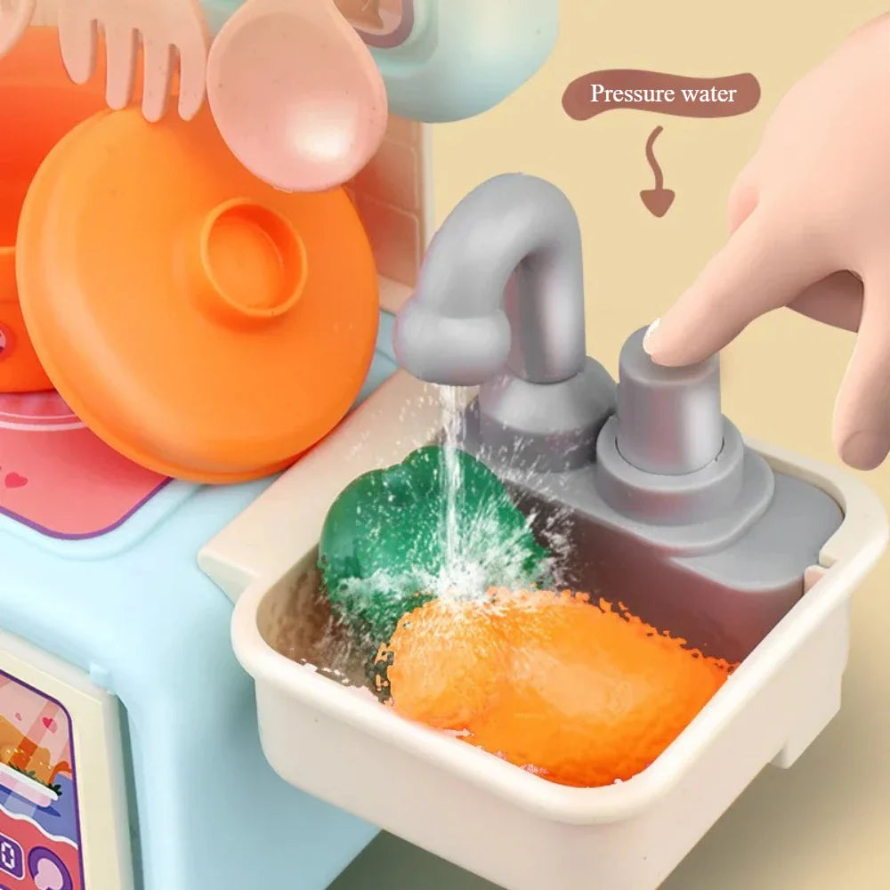 Hand pressing the sink pump to run water over play vegetables in the toy kitchen