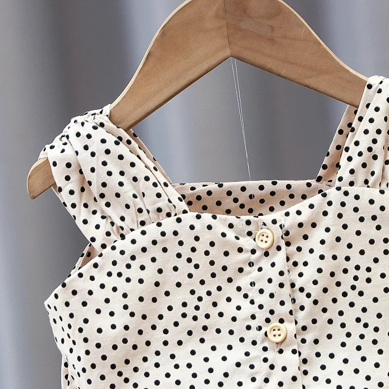 Close-up of the polka-dot top&