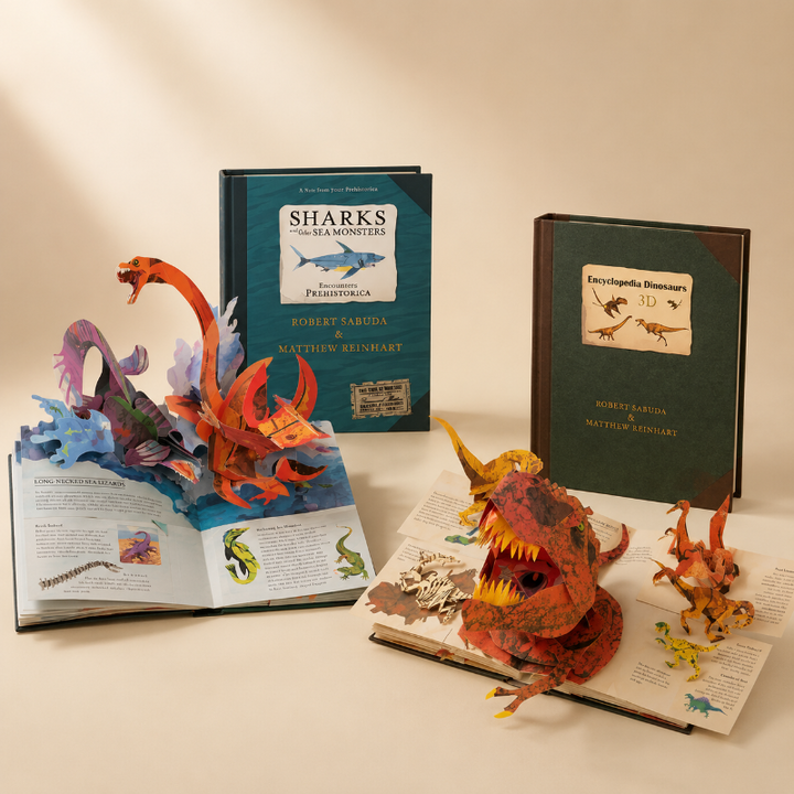 Dinosaur and sea monster pop-up books with open 3D scenes and both hardcover editions