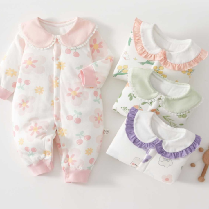 Printed baby pajamas with rounded collars and pink, green, or purple trim