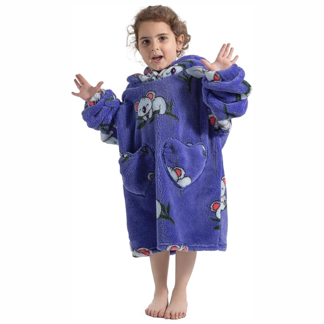 Child wearing a purple koala-print hooded blanket