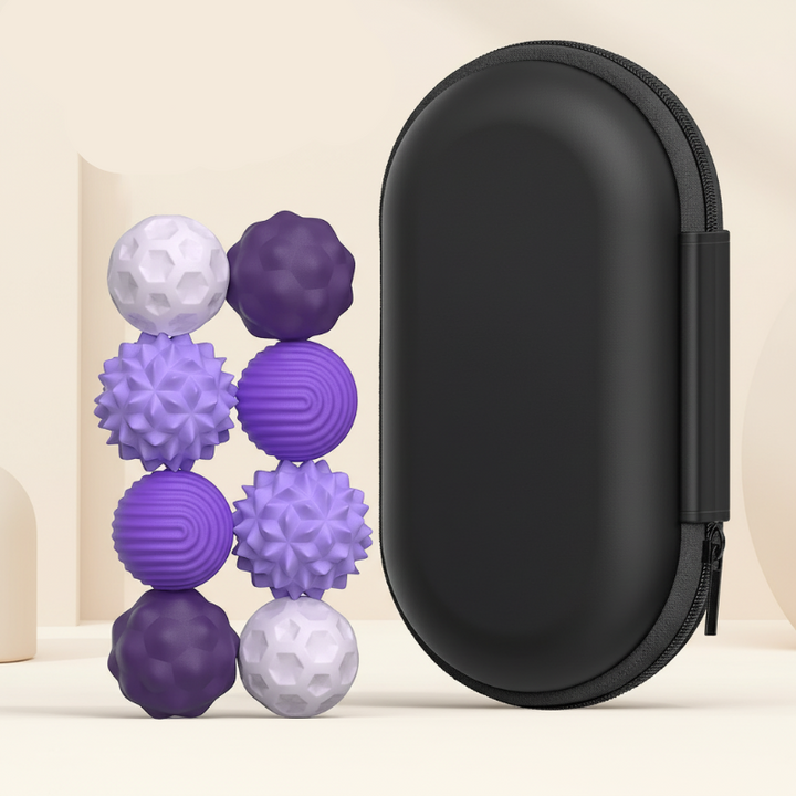 Eight small purple and lilac textured magnetic beads beside a tall black zippered case