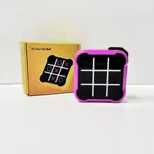 Purple electronic tic-tac-toe game with an unlit grid beside its retail box