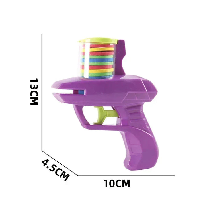 Purple toy disc blaster labeled 10 cm long, 4.5 cm wide, and 13 cm tall.