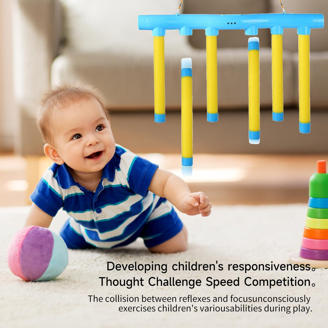 Child beside a hanging reaction trainer with yellow sticks shown dropping at different heights