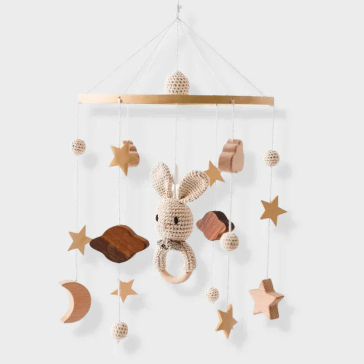 Rabbit baby mobile with a textured bunny, crescent moon, wooden stars, and colored cloud shapes
