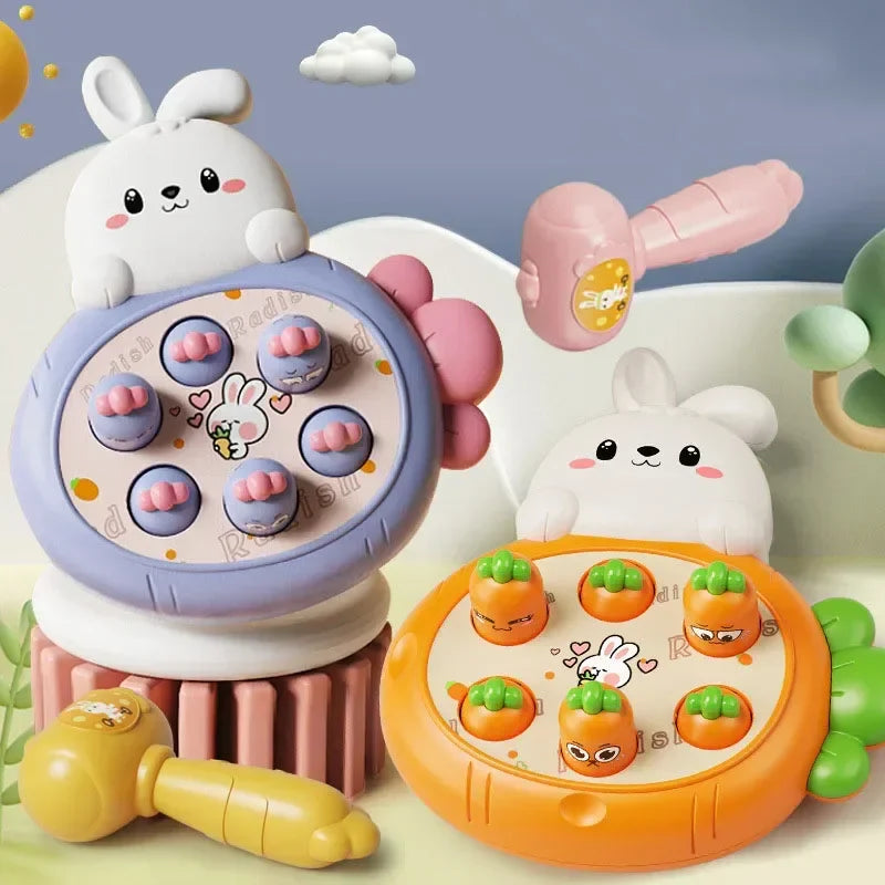 Purple and orange rabbit-themed tapping boards displayed with pink and yellow hammers