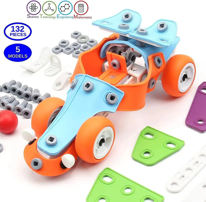 Blue and orange race car model surrounded by wheels, nuts, bolts, a wrench, and colorful panels