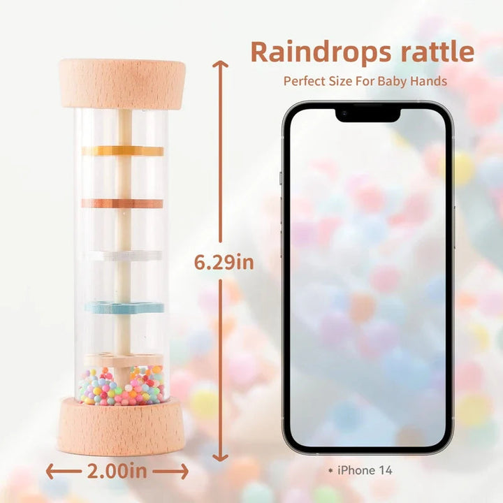 Rainstick rattle size diagram showing its height and width beside a smartphone