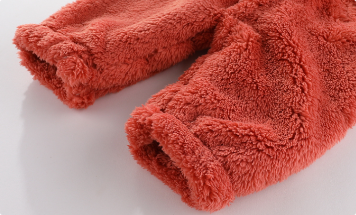 Close-up of the red baby romper&