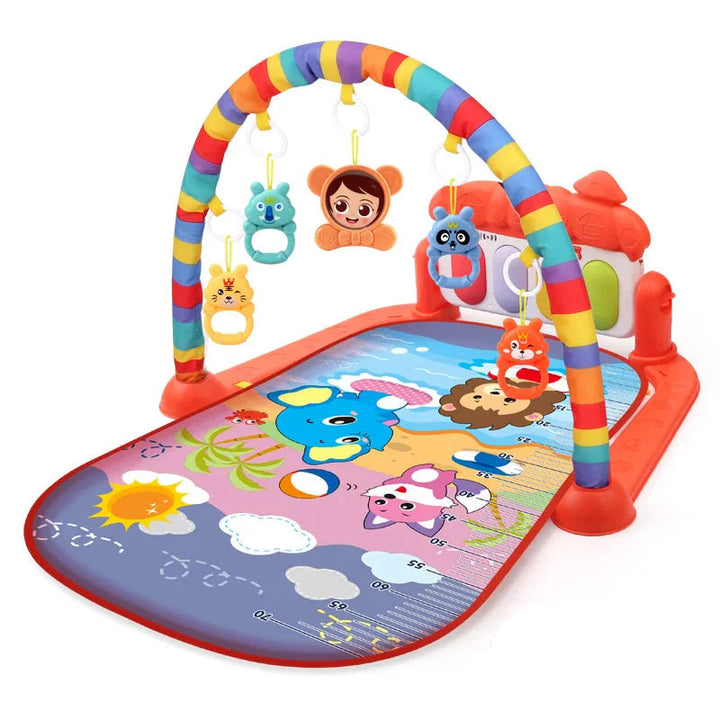 Red baby play gym with a rainbow-striped arch and beach animal illustrations