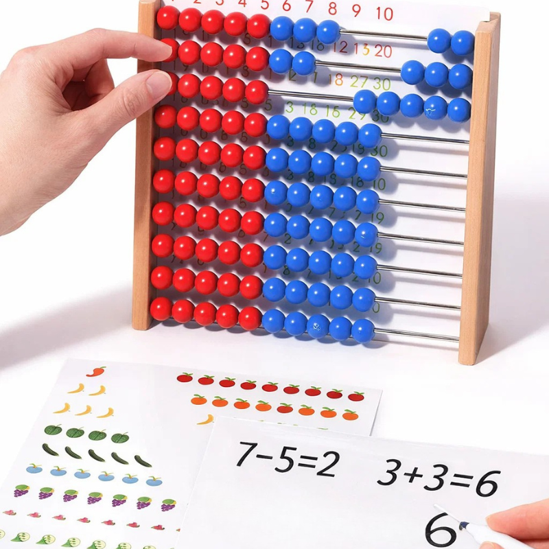 Red-and-blue bead abacus beside counting and arithmetic practice sheets