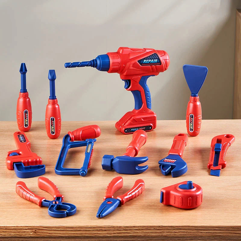 Red-and-blue toy drill and pretend hand tools arranged on a table
