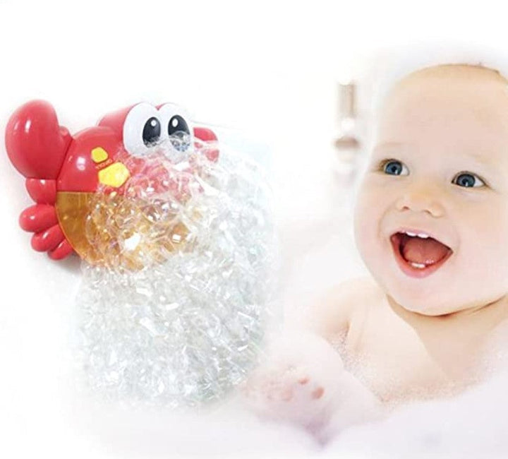Red crab bath toy blowing bubbles beside a smiling child in the bath