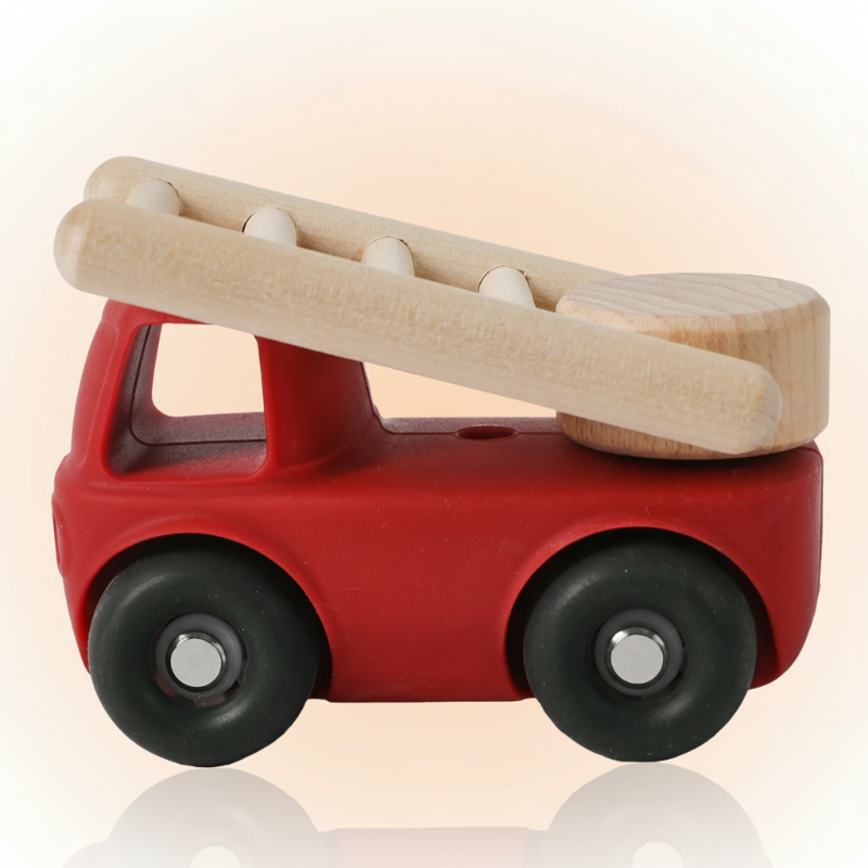 Red fire truck toy with a beige ladder and black wheels