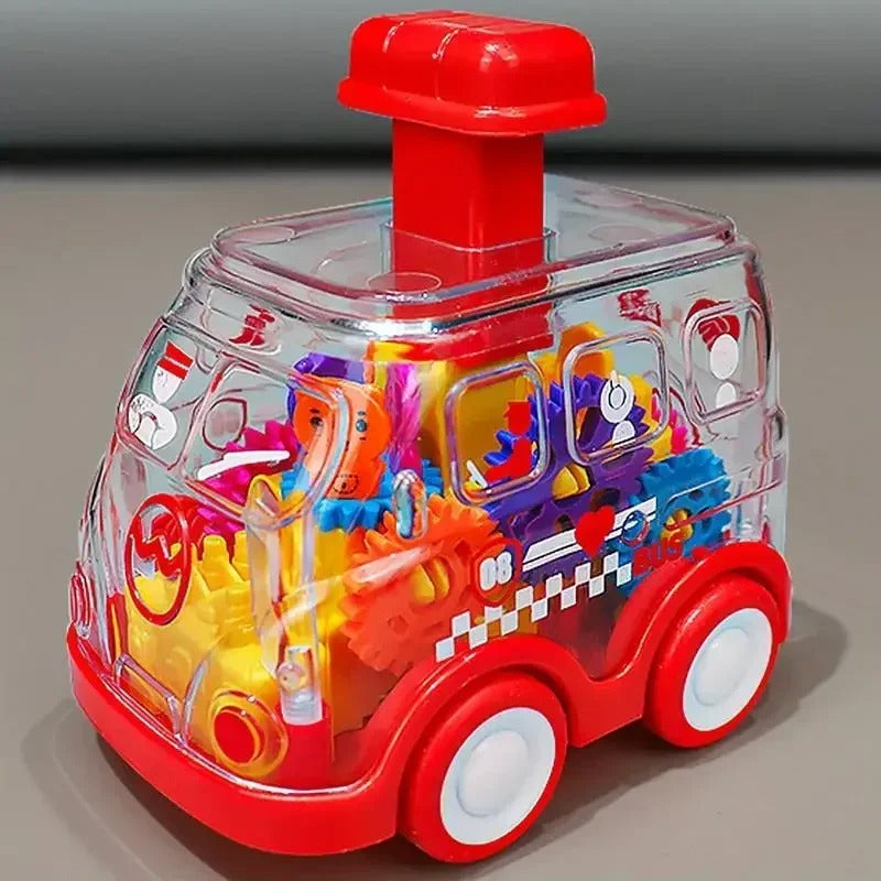Red fire truck toy with a clear body, colorful internal gears, and a red top button