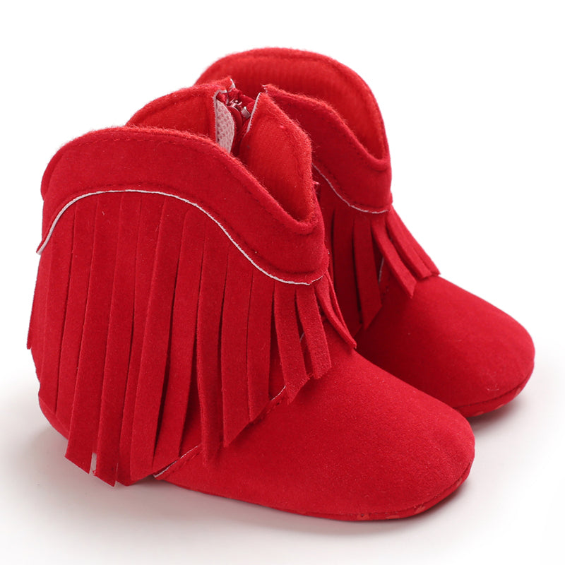 Red baby cowboy boots with fringe trim and rounded toes