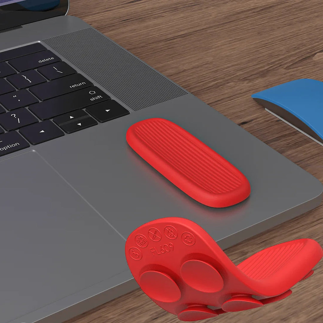 Red sensory strip on a laptop, with a folded view showing the suction-cup underside.