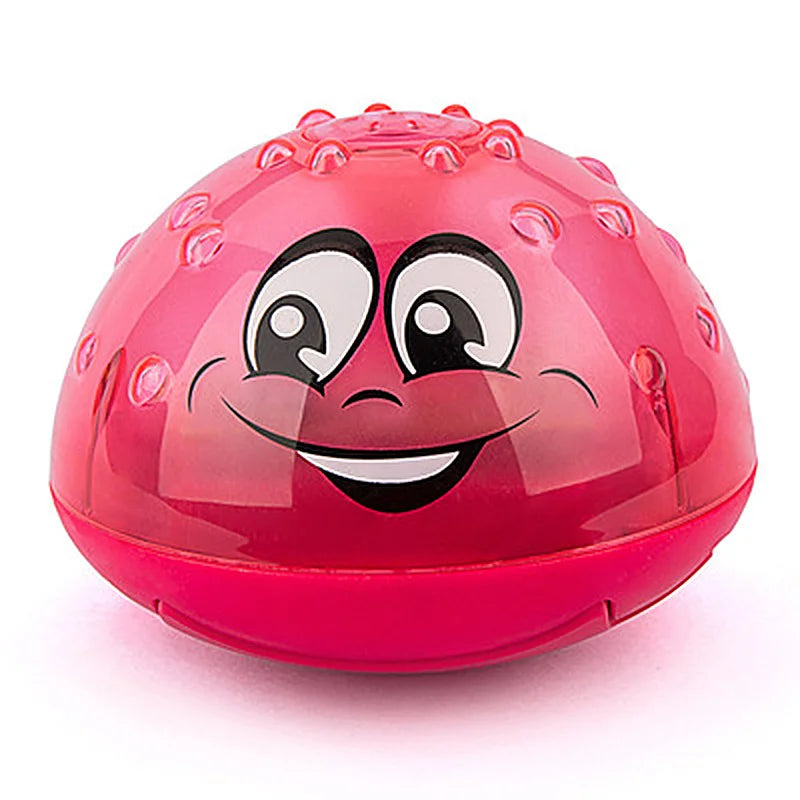 Red LED bath ball with a smiling face and raised details around the top