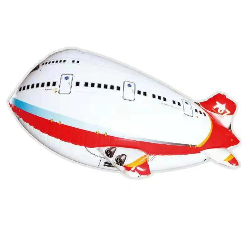 Red-and-white airplane-shaped foil balloon with printed windows and a red tail