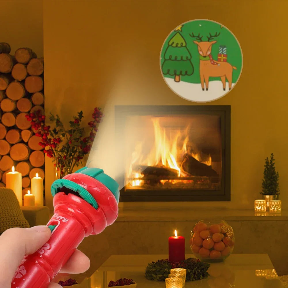 Red projection flashlight casting a Christmas tree and reindeer scene onto a wall near a fireplace