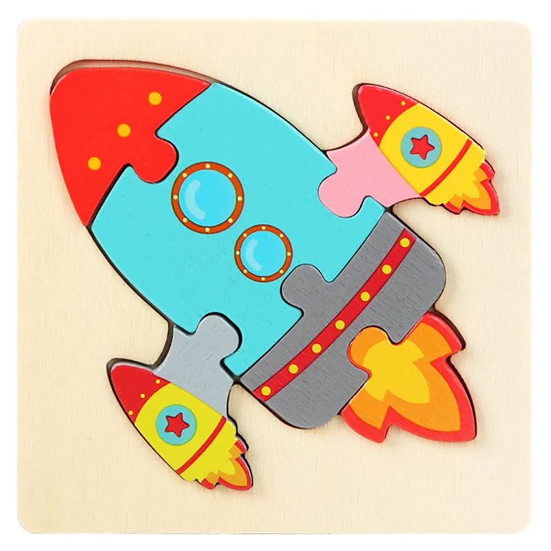 Rocket wooden jigsaw puzzle with turquoise body pieces, red fins, and yellow flame details