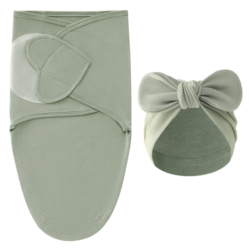 Sage green swaddle blanket and matching bow hat