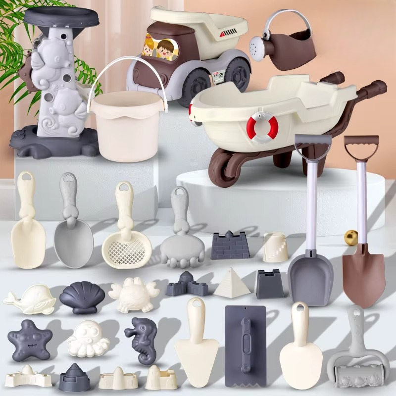 Beach toy assortment with a sand mill, dump truck, wheelbarrow, bucket, tools, and molds