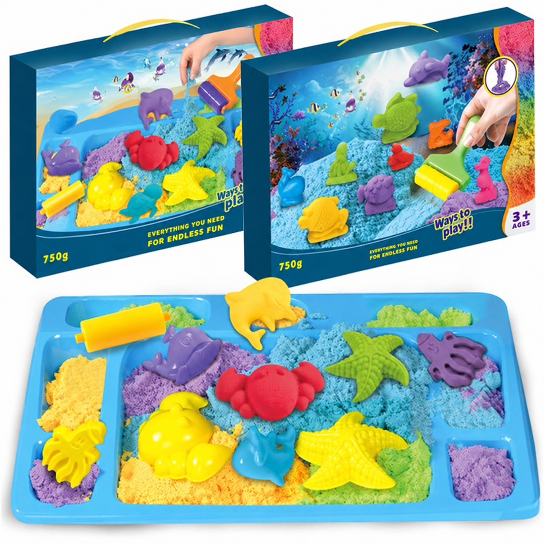 Blue play tray with colorful sand and sea animal shapes beside two boxes