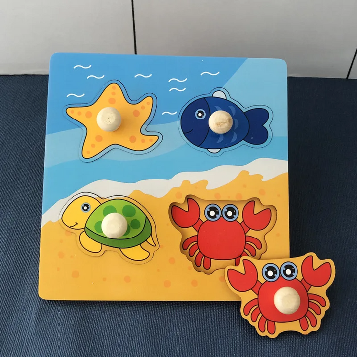 Sea creature wooden peg puzzle featuring a starfish, fish, turtle, and crab