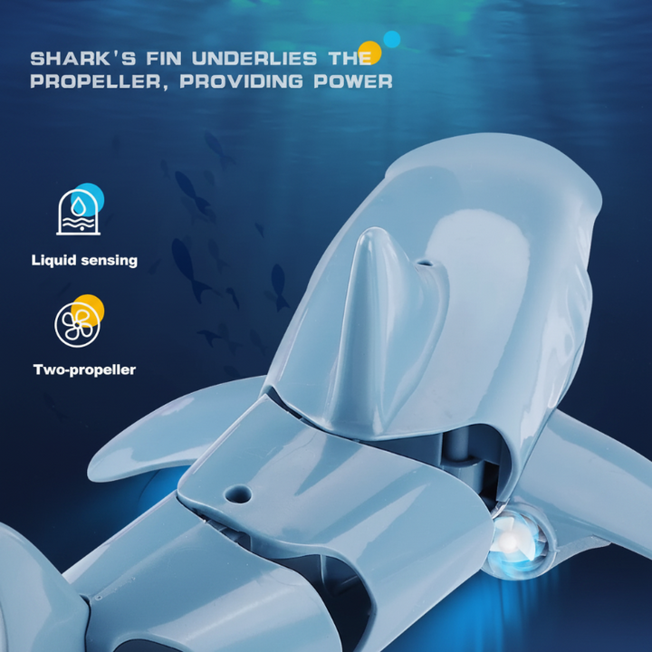 Underside view of the RC shark showing the propeller assemblies beneath its fins
