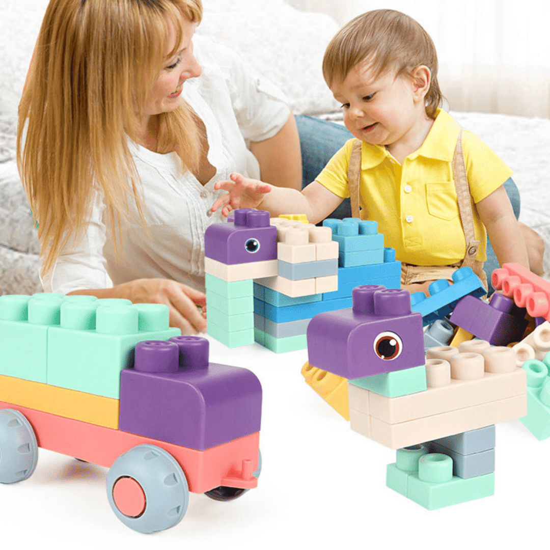Adult and child building colorful animal figures and a wheeled vehicle with silicone blocks