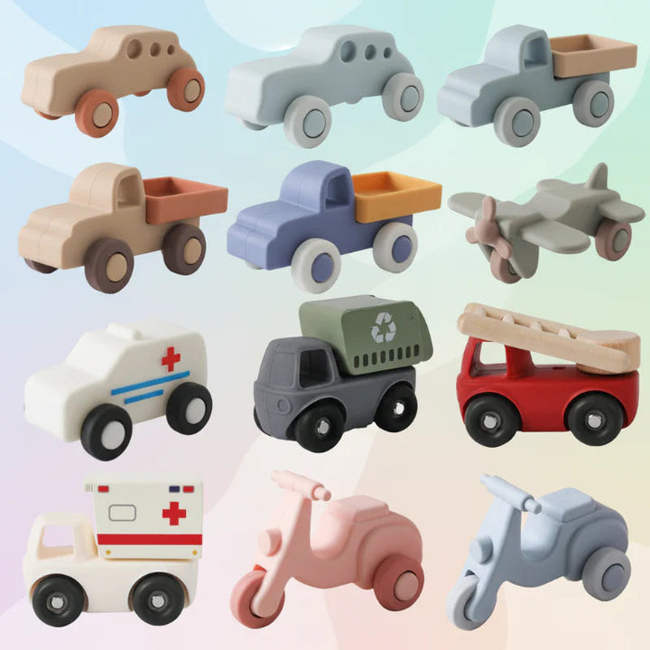 Assorted silicone toy vehicles, including cars, scooters, trucks, ambulances and an airplane