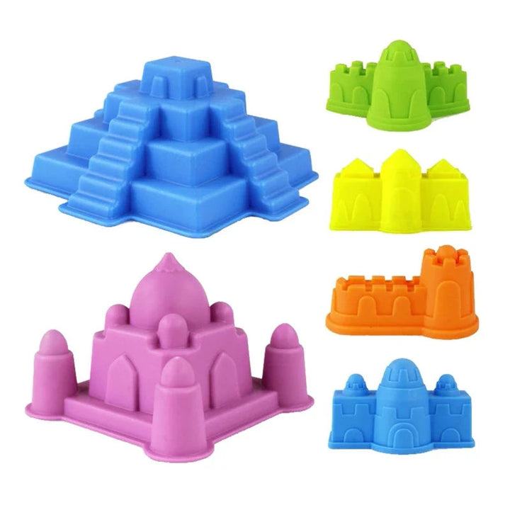 Six colorful sand molds with a domed palace, stepped pyramid, towers, and castle walls