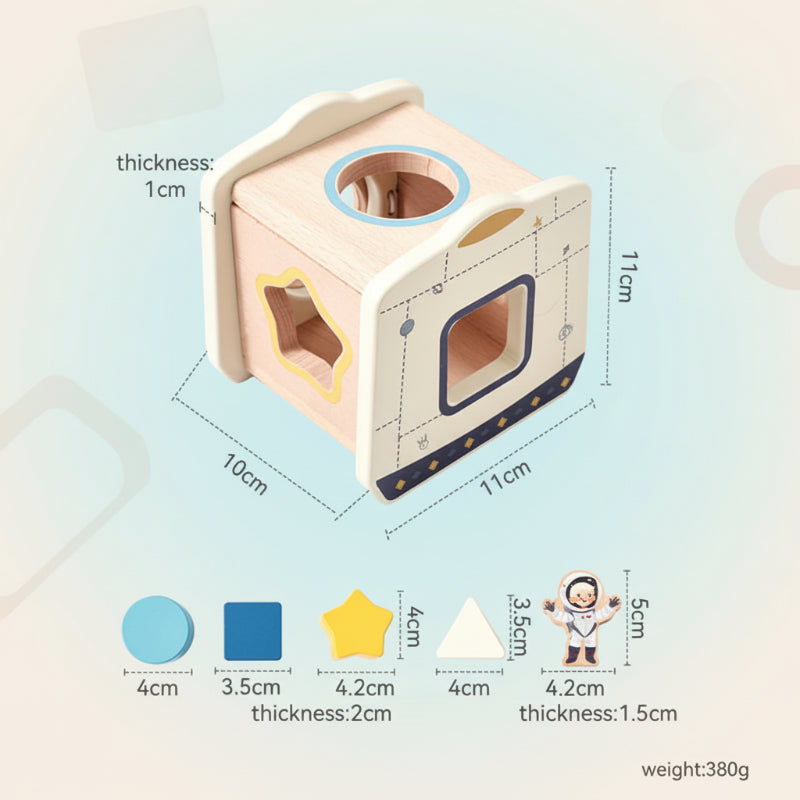 Space capsule shape sorter with measurements for the wooden box and five shaped pieces