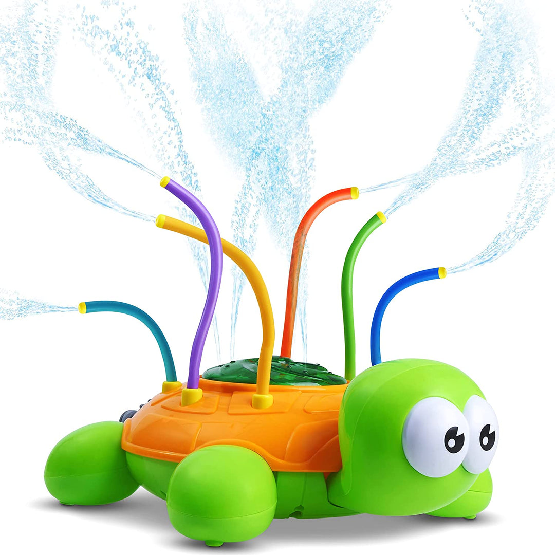 Green and orange turtle sprinkler with colorful tubes spraying water.