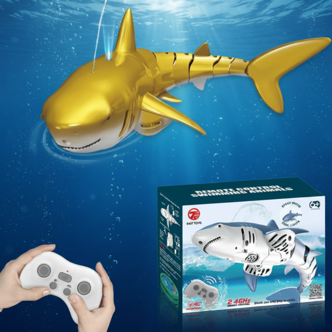 Gold-colored spouting RC shark with a white controller and retail box