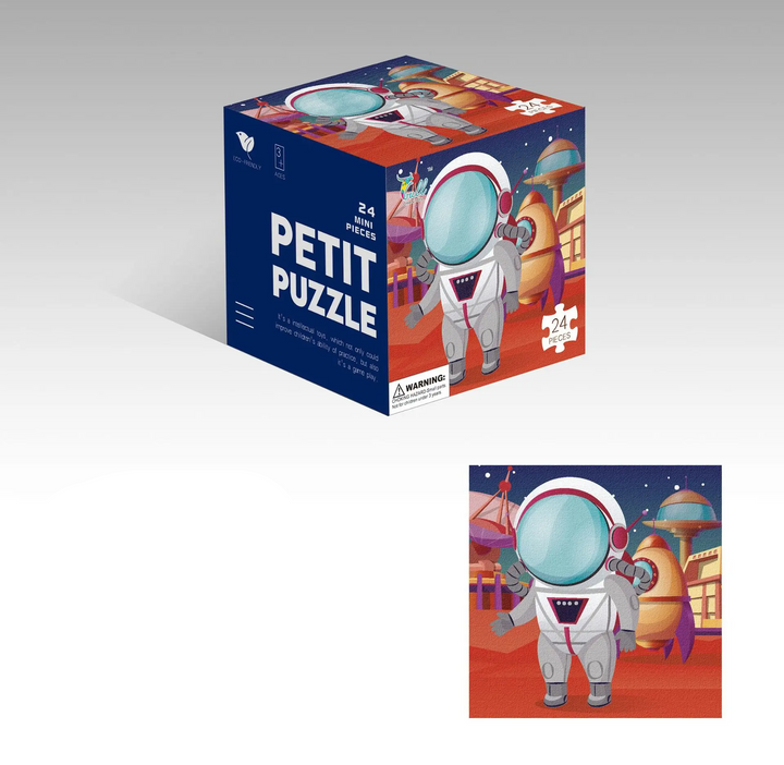Space-themed jigsaw puzzle with a standing astronaut and a matching cube box