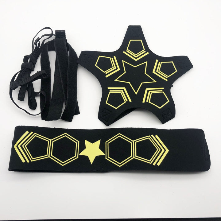 Star-pattern soccer ball holder beside its matching waist belt and coiled tether