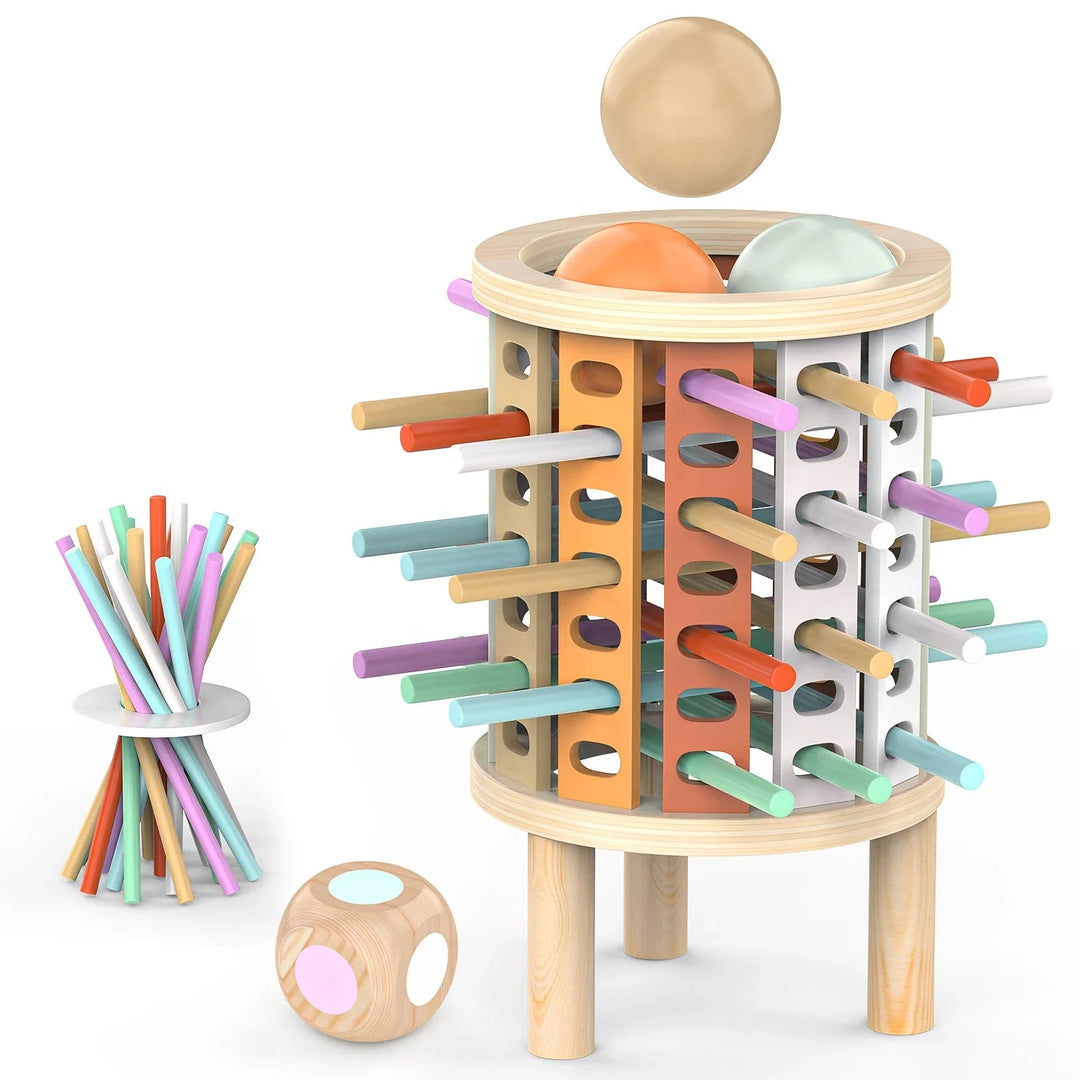 Wooden tower game with colorful sticks, three balls, a die, and a ring-supported stick bundle