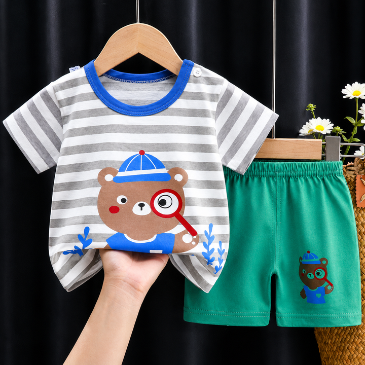 Gray-and-white striped bear shirt with blue trim and green shorts.