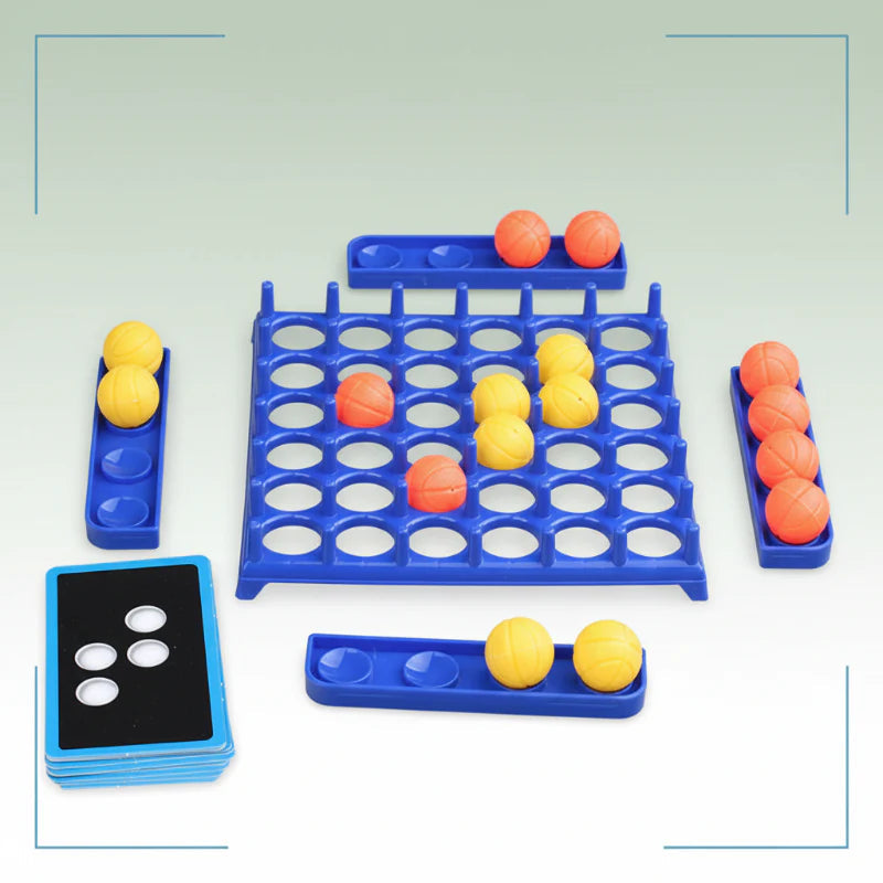Blue game board set up with yellow and orange balls, surrounding trays, and a pattern card