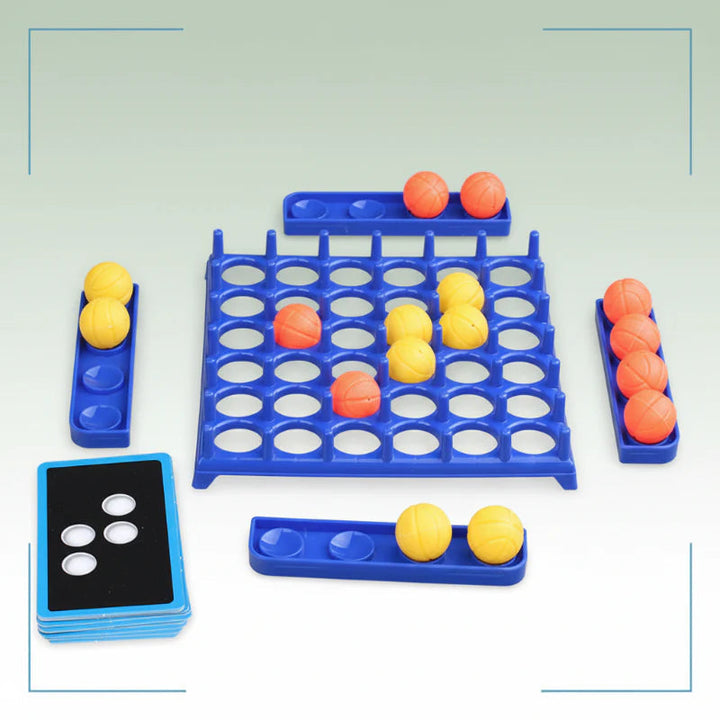 Blue game board set up with yellow and orange balls, surrounding trays, and a pattern card